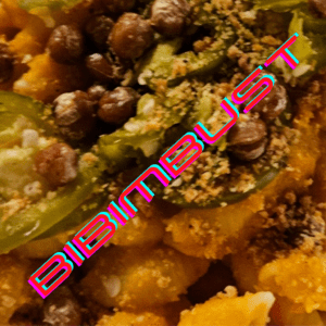 Close-up of vegan Macarenas and cheese with BIBIMBUST written across it.