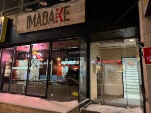 Image of front of restaurant with sign that says Imadake